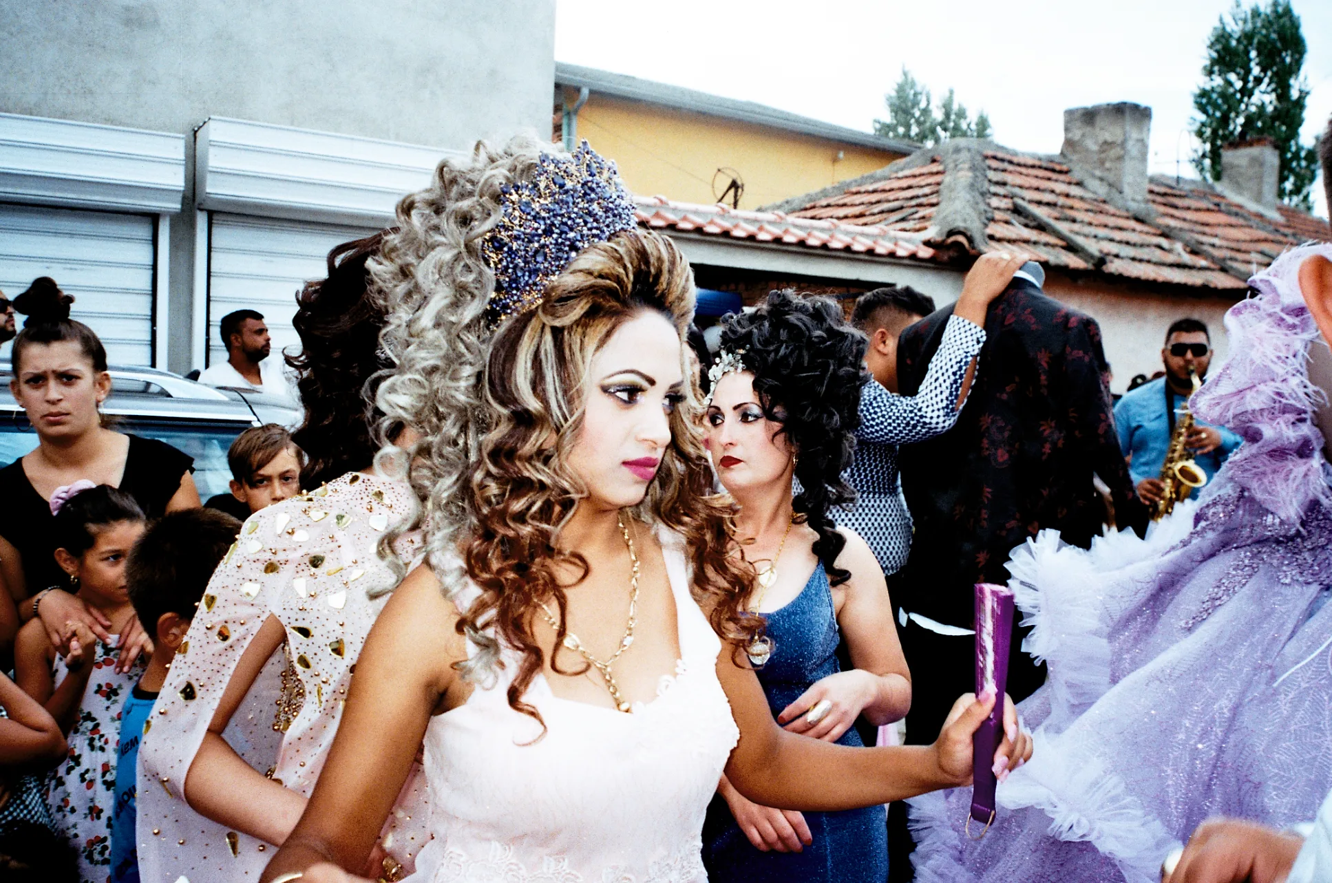 Ruth Koleva walking through a lively outdoor crowd